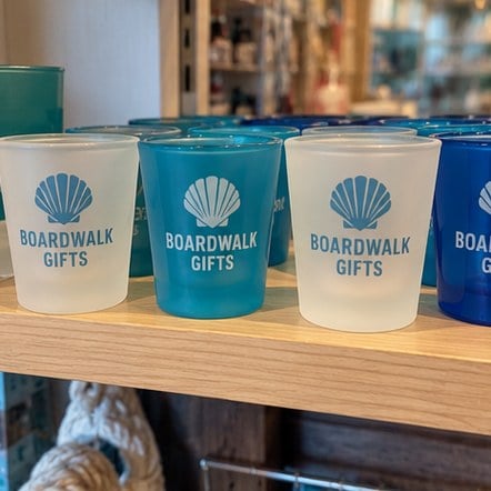 Custom souvenir shot glasses in a gift shop